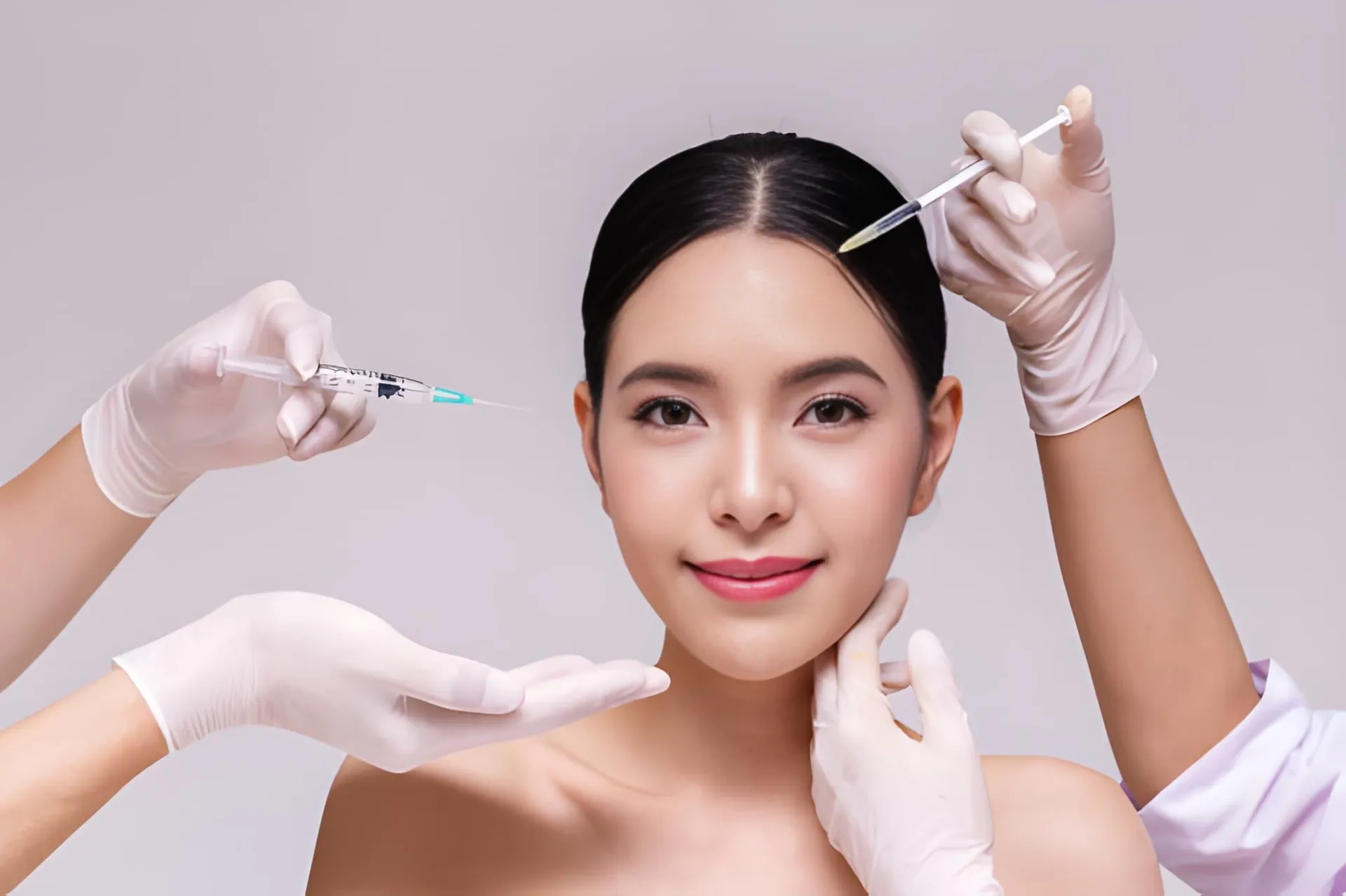 Botox Port St Lucie treatment—gloved hands prepare for facial injections in a clinical aesthetic setting.