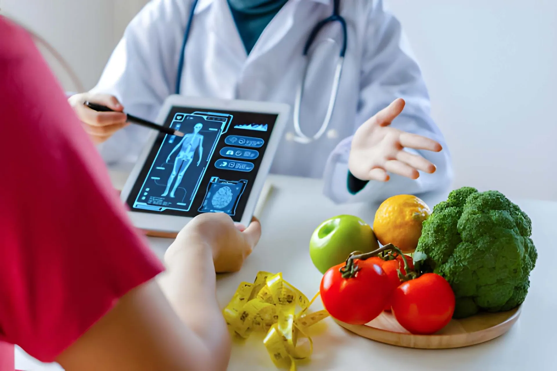 Medical weight loss Stuart FL consultation with body scan tablet, fresh produce, and nutrition-focused patient guidance.